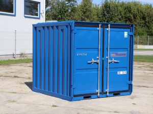 Blauer 6-Fuß-Lagercontainer mit Doppelflügeltür im Außenbereich aufgestellt